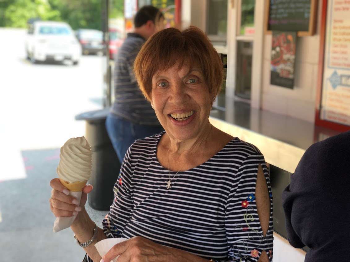 Helen Weintraub smiling and holding an ice cream cone