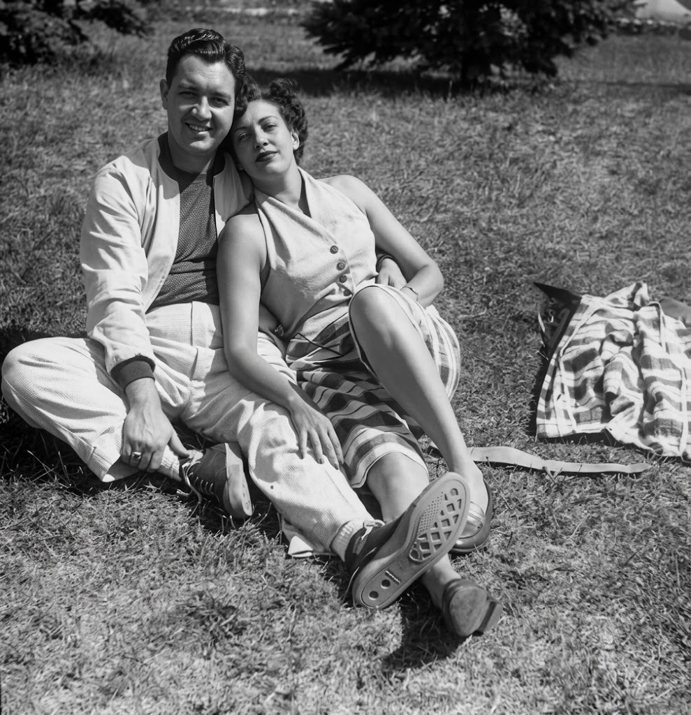 Enhanced portrait of Jacob and Eleanor Weintraub sitting together outdoors